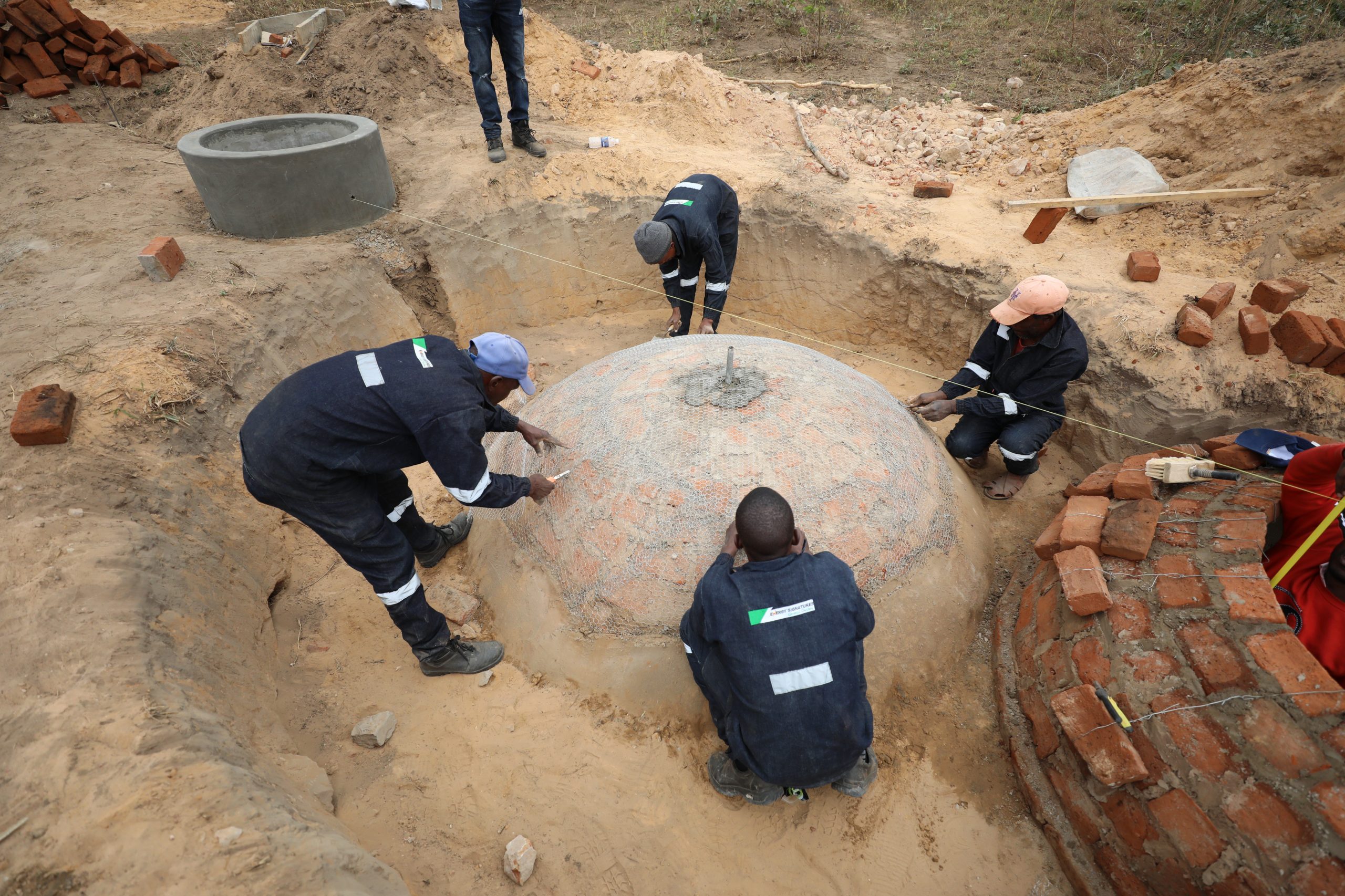 Installation of a biogas digester system designed to convert organic waste into clean energy for households in the community.